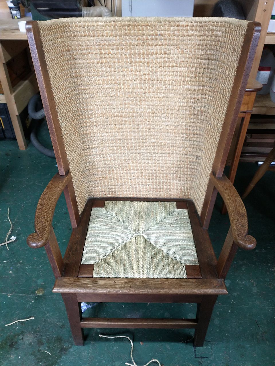 Orkney-style armchair with a tall woven straw back and a new rush seat